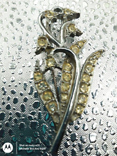 Silver Tone Snow Drop Brooch With Yellow Stones