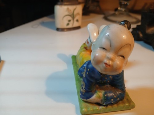 Vintage cermaic boy laying - vintage,