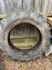 Used Firestone tractor tyre 11.2-28 from MF 35X