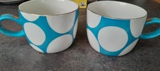 Two Socca Polka Dot Mugs.