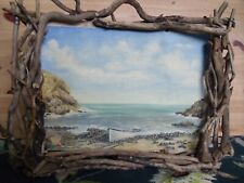 Oil painting of a boat at Cadgwith (Cornwall) set in a handmade driftwood frame