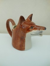 Quail pottery fox jug