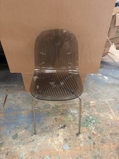 Dark acrylic chair, shell design, used, great condition. 