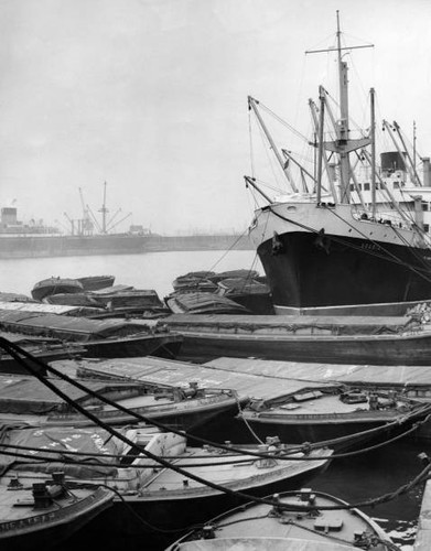 Idle barges empty freighter - an,