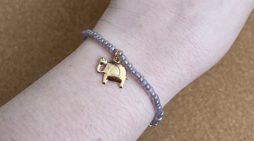Golden elephant charm - elephant,