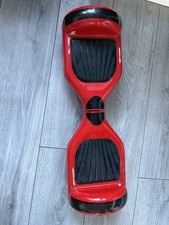 Red Hover Board and Charger Scratches On Bottom, Functional