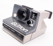 POLAROID THE BUTTON INSTANT CAMERA. FULLY WORKING CONDITION. REQUIRES SX-70 FILM