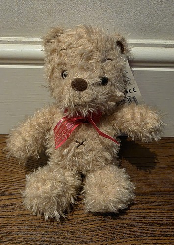 Small tan teddy - bear, plush