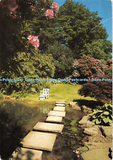 D071478 Kent Chartwell. The Golden Orfe Pool. Sir Winston Churchills chair. Davi