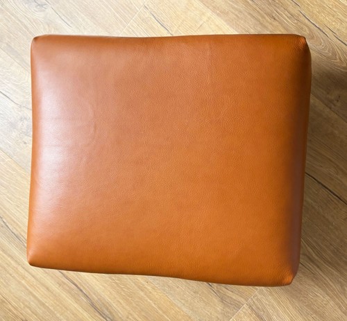 Traditional footstool covered