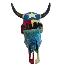 Handmade cow skull featuring a
