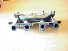 Imp Sport/ Stilletto twin stromberg inlet manifold.