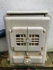 Antique enamelled cast iron Art Deco wood burning stove