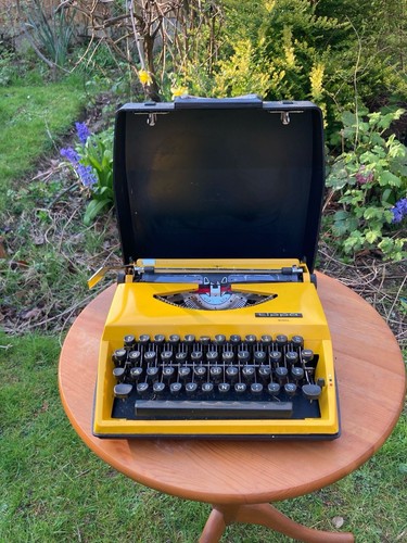 Vintage yellow typewriter - yellow,