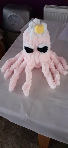 Hand knitted octopus toilet