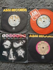 Squeeze  4 7" Singles -