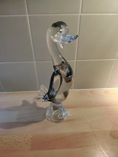 vintage hand-blown Murano glass duck figurine with a clear and smoky color.