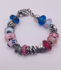 Fully loaded Trollbead bracelet, retired big fish lock, 16 charms, 5+ retired