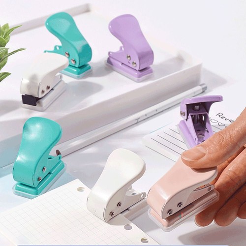 Single hole paper punch - hole,
