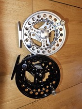 TWO UNBRANDED 7/8 FLY REELS