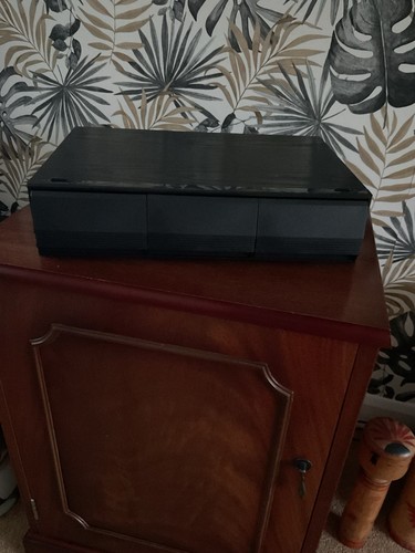 Tape cassette holder with - cassette,