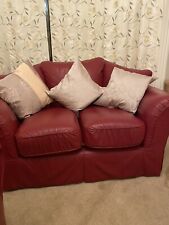 Two x 2 seater sofas deep red used in Excellent  Condition . Cushions Included
