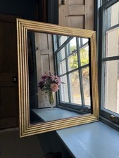 Antique French gilt Reeded framed mirror,  original foxed glass, c 1830