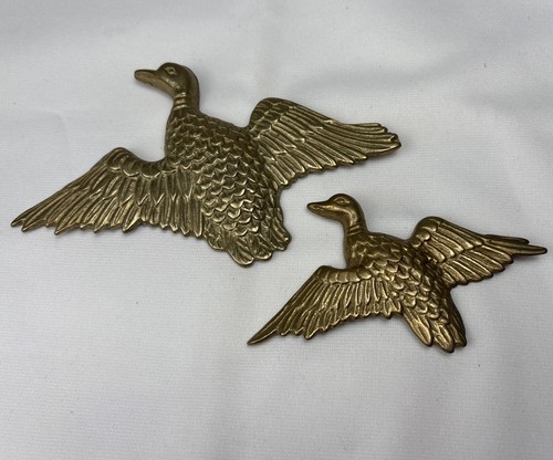 Flying brass ducks wall - flying,