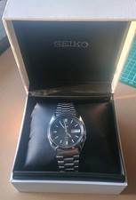 Seiko SNXS79 Automatic Watch