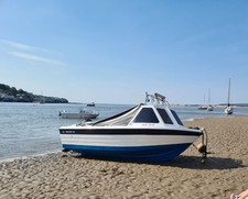 Warrior 165 Boat with barely
