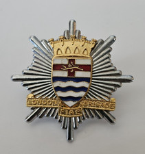 OBSOLETE london Cap Badge fire