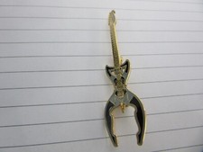 Person shaped guitar ?? strange rare unusual pin badge (DK # 14)