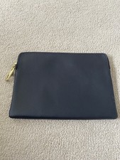 Navy leather gap zip fastening