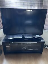 LG 42 inch TV and Cabinet