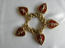 BEAUTIFUL VINTAGE BUTLER & WILSON CHUNKY HEART CUPID BRACELET with box.