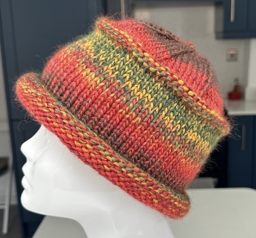 Chunky hand knitted roll brim - hand,