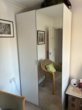 John Lewis Italian made wardrobe w/half mirror doors in white.  Good condition.
