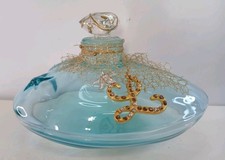 Large L de Lolita Lempicka