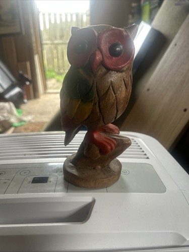 Hand carved wooden owl - hand,