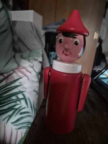Vintage pinocchio wooden coin - pinocchio,