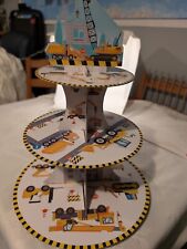 Construction 3 tier cupcake stand. Cardboard. Folds flat for storage. Used once.