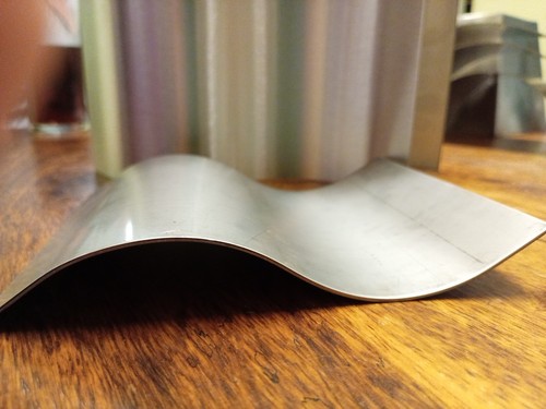 Stainless steel wave - steel, glass