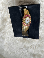 Vintage Franklin Mint ladies art deco bangle watch with rubies & mother of pearl