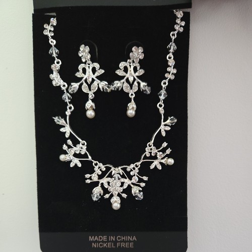 Silver necklace and earring - and,