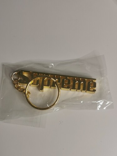 Supreme grand prix keychain - grand,