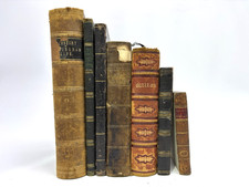 Damaged Old Books with Leather Spines for Decoration. 21cm shelf space.