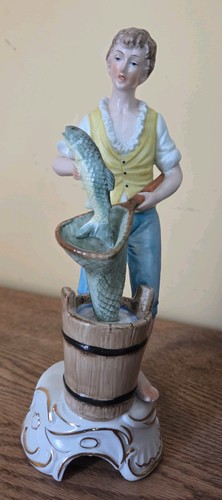 German figurine fisherman boy