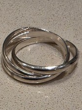 sterling silver Russian wedding  ring having three interspersed bands