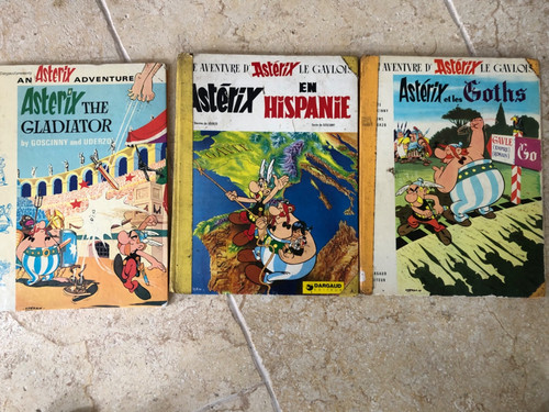 Three 1980s asterix books - three,
