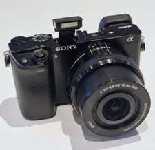 Sony Alpha A6000 Mirrorless Digital Camera with 16-50mm Lens, Case & Accessories